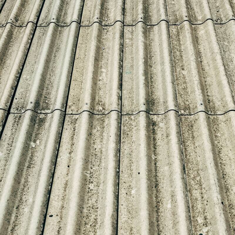 Asbestos roof tiles